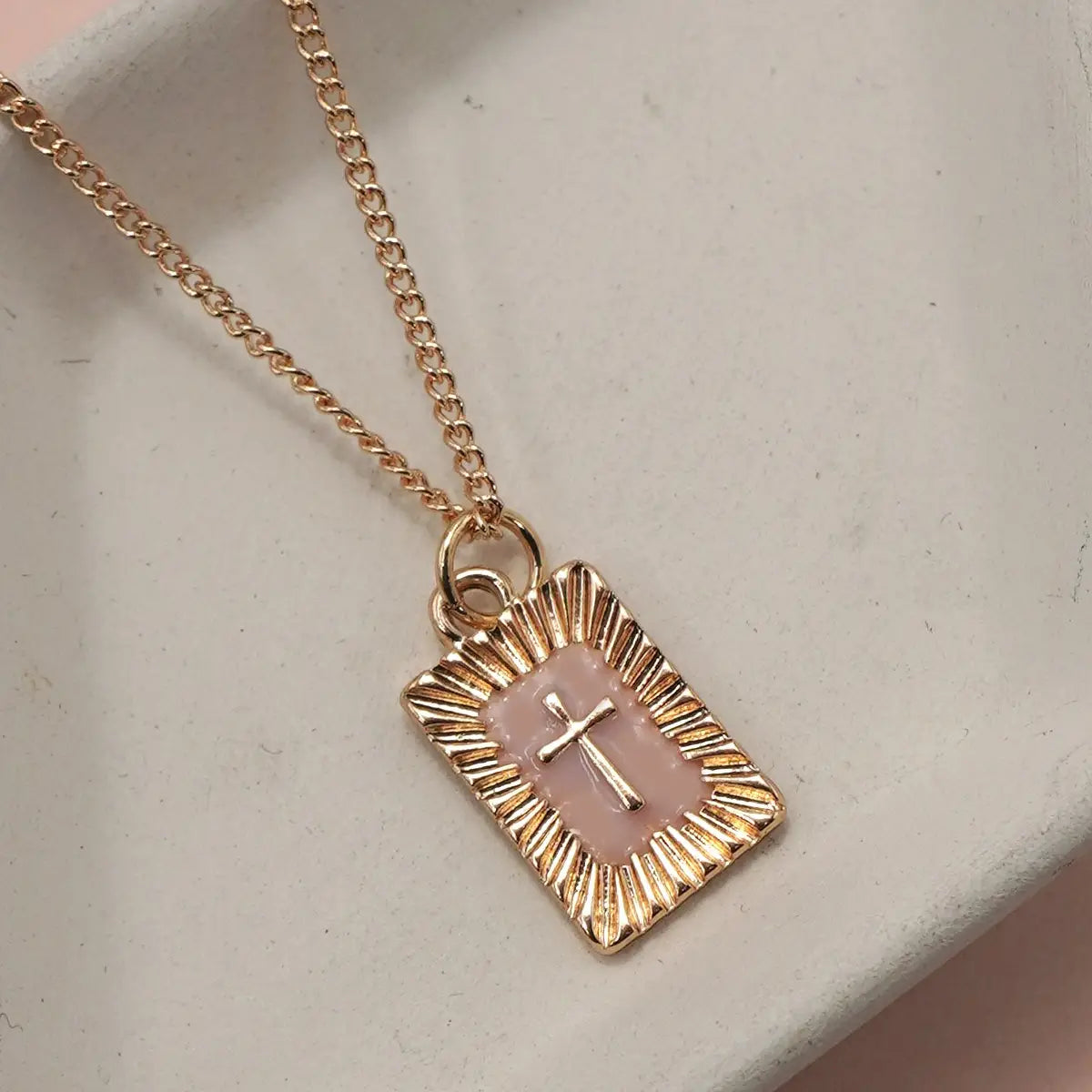 SUNBURST CROSS PENDANT