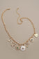 EMERALD SUN NECKLACE