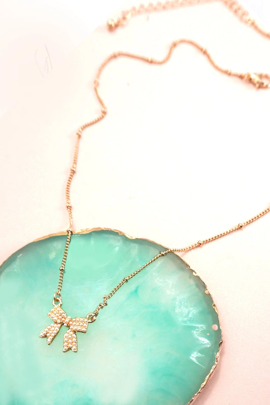 THE PEARL BOW NECKLACE