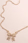 THE PEARL BOW NECKLACE